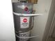 Close-up of a Rheem Performance water heater in a closet at 2409 Maroney Ave, Las Vegas, NV 89104