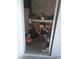 The detached shed with cement walls is used for storage at 2409 Maroney Ave, Las Vegas, NV 89104
