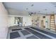 Spacious garage with tool storage, utility sink, and overhead lighting at 2437 Desert Butte Dr, Las Vegas, NV 89134