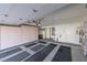 Bright garage area featuring built-in storage units and recessed lighting fixtures at 2437 Desert Butte Dr, Las Vegas, NV 89134