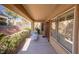 Cozy covered patio featuring desert landscaping, ideal for outdoor relaxation and entertaining at 2437 Desert Butte Dr, Las Vegas, NV 89134