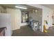 Functional utility room featuring water filtration system, washing sink, and ample storage cabinets at 2437 Desert Butte Dr, Las Vegas, NV 89134