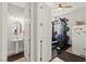 A bright home gym with half bath features weight training equipment at 245 Hull St, Henderson, NV 89015
