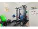 Home gym featuring weight training equipment and natural light at 245 Hull St, Henderson, NV 89015