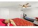 Comfortable main bedroom with a ceiling fan, neutral walls, and two beds at 245 Hull St, Henderson, NV 89015