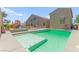 Beautiful pool area features built-in spa and playset at 245 Hull St, Henderson, NV 89015