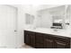Modern bathroom featuring dual vanities, sleek cabinetry, and a large mirror, creating a spa-like atmosphere at 2495 Sunflower Days Ave # 2052, North Las Vegas, NV 89031