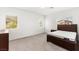 Bright bedroom featuring neutral carpeting, ample natural light, and a comfortable, spacious layout at 2495 Sunflower Days Ave # 2052, North Las Vegas, NV 89031