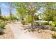 Park featuring a stone walking path and picnic tables at 2495 Sunflower Days Ave # 2052, North Las Vegas, NV 89031