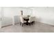 Cozy dining area with table for six with natural light and seamless flow to living area at 2495 Sunflower Days Ave # 2052, North Las Vegas, NV 89031