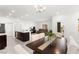 Spacious open living area with modern kitchen, dining area, and cozy living room perfect for gatherings at 2495 Sunflower Days Ave # 2052, North Las Vegas, NV 89031