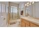 Clean bathroom with a shower-tub combo, tile flooring, and vanity with lots of storage at 2500 Wimbledon Dr, Las Vegas, NV 89107
