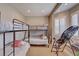 Bedroom with multiple bunk beds and a window with plantation shutters at 2500 Wimbledon Dr, Las Vegas, NV 89107