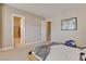 Cozy bedroom with ensuite bathroom, neutral decor, and a modern style at 2500 Wimbledon Dr, Las Vegas, NV 89107