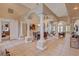 Elegant dining area with decorative columns and tile flooring, ideal for formal gatherings at 2500 Wimbledon Dr, Las Vegas, NV 89107