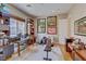 This home office has a modern desk setup, neutral carpet and natural light at 2500 Wimbledon Dr, Las Vegas, NV 89107