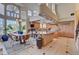 Well-appointed kitchen with an island, stainless steel appliances, ample natural light, and an adjacent dining area at 2500 Wimbledon Dr, Las Vegas, NV 89107