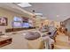 Spacious living room with skylights, multiple TVs, comfortable seating, and a relaxed atmosphere at 2500 Wimbledon Dr, Las Vegas, NV 89107