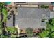 Overhead shot of backyard features patio, lush grass, and detailed stonework at 2687 Ivoryhill St, Las Vegas, NV 89135