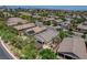 An aerial view showing a desert home with landscaped yard and patio space in a large neighborhood at 2687 Ivoryhill St, Las Vegas, NV 89135