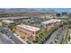 An aerial view of a commercial shopping center in Downtown Summerlin with well-maintained landscaping and ample parking at 2687 Ivoryhill St, Las Vegas, NV 89135
