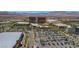 Expansive aerial view of the Red Rock Casino Resort and Spa, featuring meticulously landscaped parking and desert mountains beyond at 2687 Ivoryhill St, Las Vegas, NV 89135