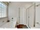 Modern bathroom showcasing a soaking tub and glass-enclosed shower at 2687 Ivoryhill St, Las Vegas, NV 89135