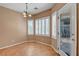 Cozy dining area with tile floors, bright windows, and access to outdoor patio at 2687 Ivoryhill St, Las Vegas, NV 89135