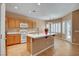 Kitchen with a center island, stainless appliances, and tile floors at 2687 Ivoryhill St, Las Vegas, NV 89135