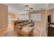 A living room and kitchen with tile floors, and stainless appliances at 2687 Ivoryhill St, Las Vegas, NV 89135