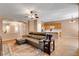 Living room with tile floors, views to kitchen, dining, and entry at 2687 Ivoryhill St, Las Vegas, NV 89135