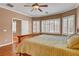A spacious main bedroom featuring plush carpets, white trim, and large windows at 2687 Ivoryhill St, Las Vegas, NV 89135
