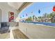 Cozy balcony featuring wood floors, string lights, and outdoor seating for relaxing and enjoying the views at 2725 S Nellis Blvd # 2084, Las Vegas, NV 89121