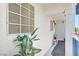 Cozy balcony with decorative plant and hanging lights at 2725 S Nellis Blvd # 2084, Las Vegas, NV 89121