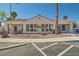 Community clubhouse featuring a welcoming entrance, accessible ramps and beautiful landscaping at 2725 S Nellis Blvd # 2084, Las Vegas, NV 89121