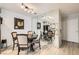 Dining room with an elegant mirror wall. Includes luxury vinyl flooring and adjacent seating area at 2725 S Nellis Blvd # 2084, Las Vegas, NV 89121