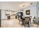 Eat-in kitchen is upgraded with stainless appliances and granite counters with a dining area at 2725 S Nellis Blvd # 2084, Las Vegas, NV 89121