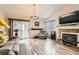 Inviting living room with a cozy fireplace, comfortable seating, and plenty of natural light at 2725 S Nellis Blvd # 2084, Las Vegas, NV 89121