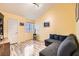 Cozy living room with vaulted ceilings, light wood floors and a comfy gray sofa at 2725 S Nellis Blvd # 2084, Las Vegas, NV 89121