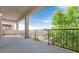 This balcony features rod iron railing and has a view of the neighborhood at 2864 Kinknockie Way, Henderson, NV 89044