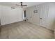This is a spacious bedroom featuring updated flooring, paint, and lighting fixtures at 2867 Geary Pl # 3008, Las Vegas, NV 89109