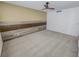 Spacious bedroom features a statement wall, neutral carpet, and plenty of natural light at 2867 Geary Pl # 3008, Las Vegas, NV 89109