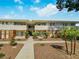Well-maintained condominium with mature landscaping and a charming patio seating area at 2867 Geary Pl # 3008, Las Vegas, NV 89109