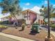 Low-angle shot of the condominium's exterior featuring manicured landscaping and convenient sidewalk access at 2867 Geary Pl # 3008, Las Vegas, NV 89109