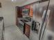 This kitchen features modern stainless-steel appliances and granite countertops at 2867 Geary Pl # 3008, Las Vegas, NV 89109