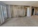 Bright living room features updated flooring and large windows, creating an inviting space at 2867 Geary Pl # 3008, Las Vegas, NV 89109