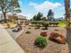 Community outdoor grill area featuring a stainless steel grill and manicured gravel landscaping at 2867 Geary Pl # 3008, Las Vegas, NV 89109