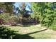 This home features a spacious, verdant backyard with mature trees, ideal for relaxation and recreation at 30 Diamond Bar Rd, Pahrump, NV 89048