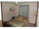 Bedroom with ceiling fan and window at 30 Diamond Bar Rd, Pahrump, NV 89048