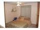 Bedroom with ceiling fan and window at 30 Diamond Bar Rd, Pahrump, NV 89048
